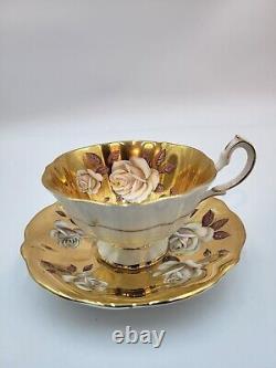 Rare Queen Anne Teacup And Saucer Ivory Rose Pattern Completely Gold Guilded